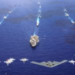 A B-2 Spirit and 16 other aircraft from the Air Force, Navy and Marine Corps fly over the USS Kitty Hawk, USS Ronald Reagan and USS Abraham Lincoln carrier strike groups in the western Pacific Ocean on Sunday, June 18, to kick off Exercise Valiant Shield 2006. The joint exercise consists of 28 naval vessels, more than 300 aircraft and approximately 20,000 servicemembers. (U.S. Navy photo/Chief Photographer's Mate Todd P. Cichonowicz)